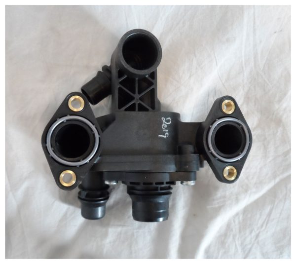 C6 Thermostat Housing - 1336Y3